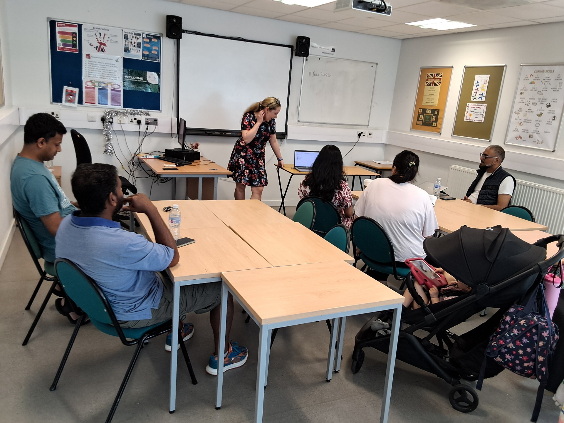 Olivia welcoming parents at the first Coffee Morning